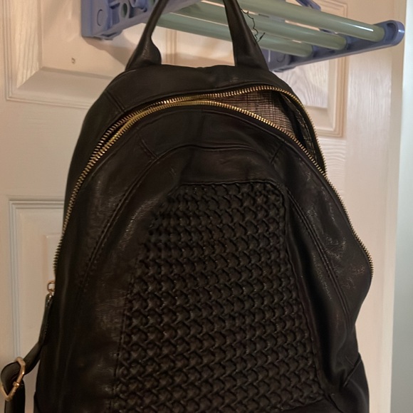 Handbags - Black Woven Leather Backpack